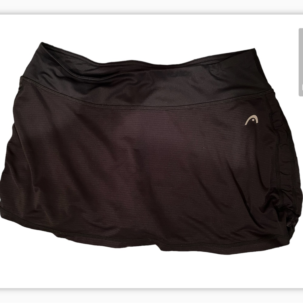 Head tennis skirt large, with side adjustments on the skirt. Black